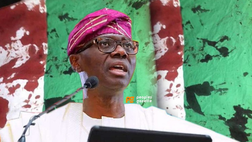Sanwo-Olu-and-stained-flag