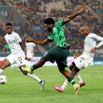 Ola Aina (middle) battles with two South African defenders during the semifinals of the 2023 African Cup of Nations.